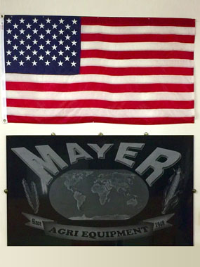 USA Flag and Mayer Agri Equipment sign